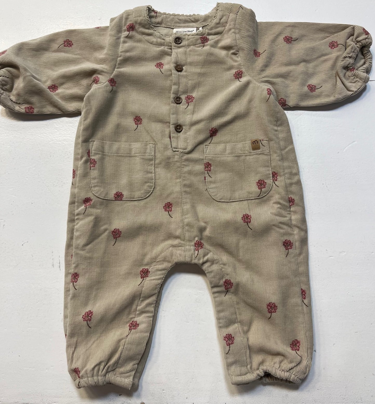 Baby Einteiler aus feinem Cord mit Blütenprint
